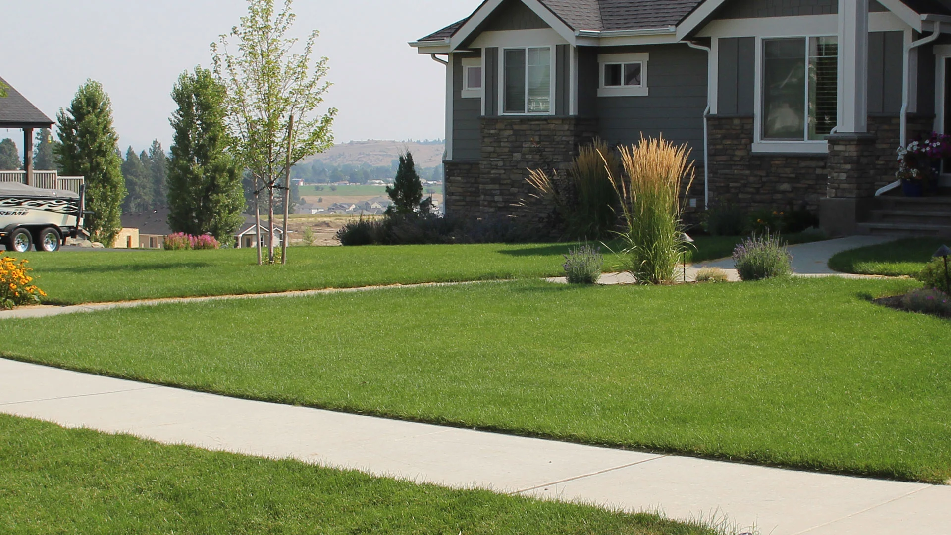 This house in South Hill neighborhood has a large lawn that requires fertilization and weed control treatments.