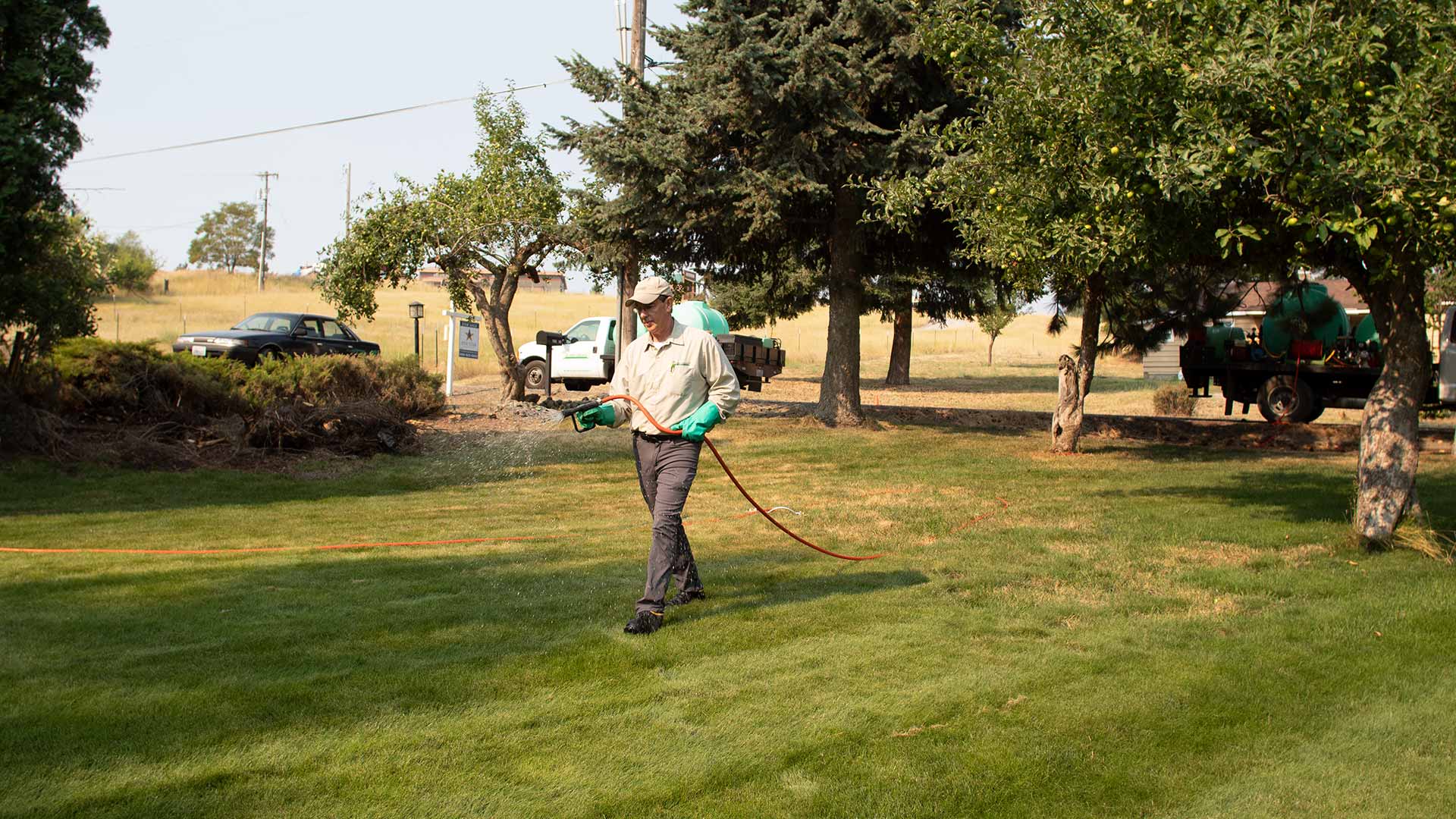 Weed control treatment being applied on a Spokane, WA lawn.