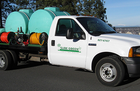 Spray truck with contact information.