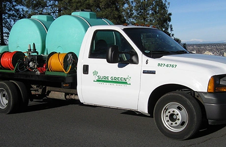 Spray truck with contact information.