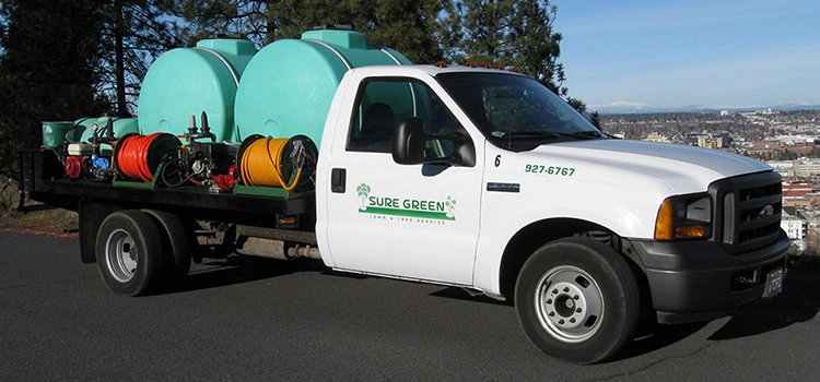 Sure Green Lawn & Tree Service fertilizing truck in Spokane Valley, WA.